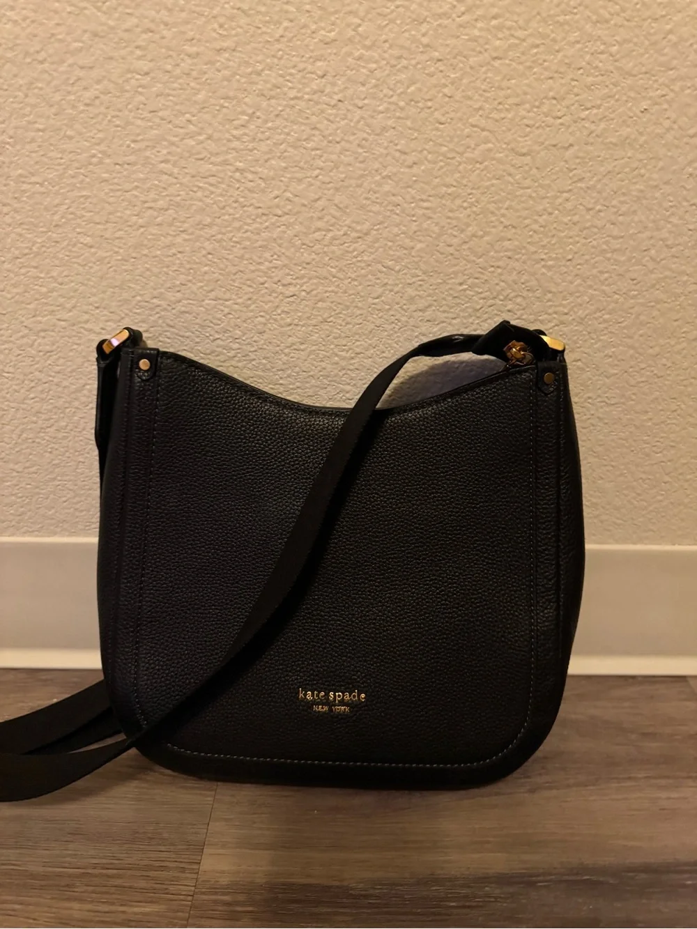 kate spade Black Pebbled Leather Curved Crossbody with Gold Hardware